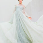 "Mint green Nelly Dress with cloche wavy design, corset bodice, and soft fabric, perfect for elegant evening events, weddings, and engagement parties."